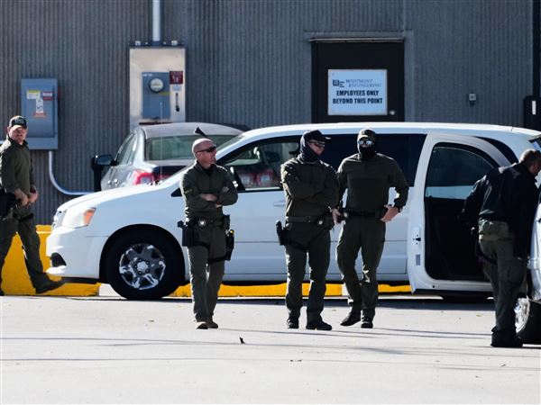 Federal Patrol agents stand outside an ICE processing facility in the Chicago suburb of Broadview, Ill., Oct. 21.
