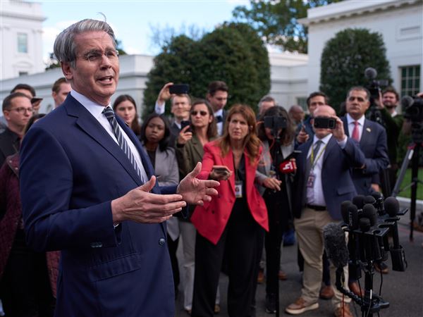 Treasury Secretary Scott Bessent speaks with reporters at the White House on Oct. 22 in Washington.