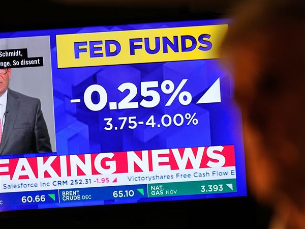 Stock market waffles around its records after Fed cuts rates