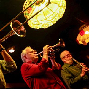 The Cakewalkin' Jass Band plays favored songs in a special tribute for beloved trumpeter Frank Ward.