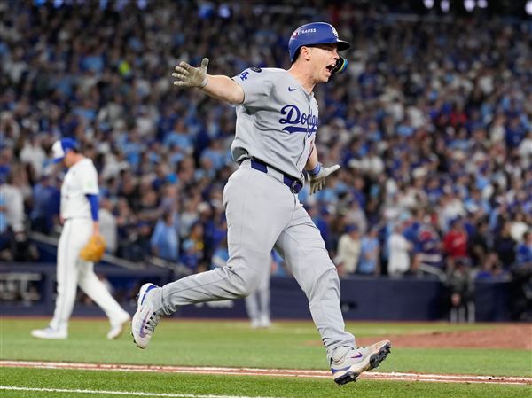Smith's homer in 11th lifts Dodgers over Blue Jays 5-4 to become first repeat champion in 25 years