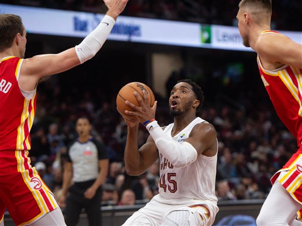 Donovan Mitchell scores 37 points as Cavaliers down Young-less Hawks 117-109