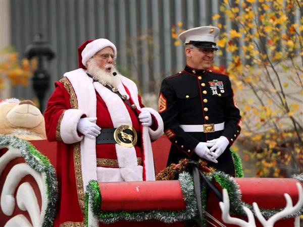 Santa Claus makes his appearance at the end of the Blade Holiday Parade in Toledo. 