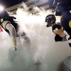 Toledo players run out ahead of a Mid-American Conference college football game against Northern Illinois on Nov. 5 at UT’s Glass Bowl in Toledo.
