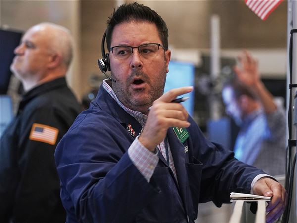 Options trader Andrew Longaro works on the floor of the New York Stock Exchange on Nov. 5.