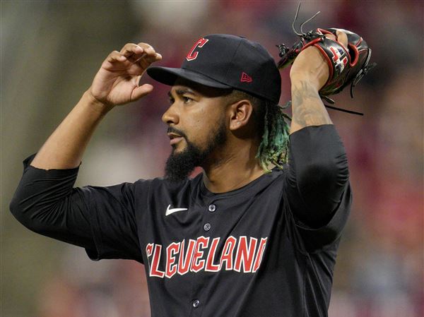 Cleveland Guardians' Emmanuel Clase looks to throw during a baseball game against the Cincinnati Reds on June 11, 2024, in Cincinnati.