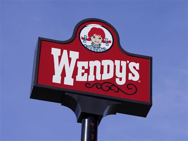 This Thursday, Feb. 25, 2021, photo shows a sign over a Wendy's restaurant in Des Moines, Iowa.