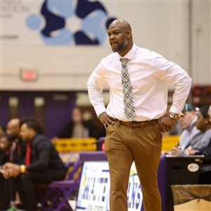 Start’s head coach Tareem Warren watches his team during a boys basketball game between Start High School and Rogers High School at Waite High School on Feb.13, 2024 in Toledo. 