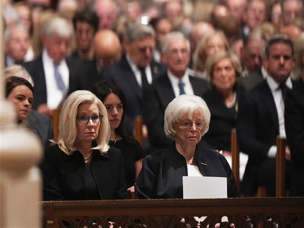 Lynne Cheney, seated front right, and daughter Liz Cheney, seated front left, look on during the funeral for former Vice President Dick Cheney on Nov. 20 at the Washington National Cathedral.
