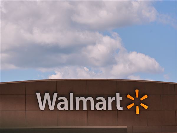 Clouds pass over a Walmart store on Aug. 14 in Manchester, N.H.