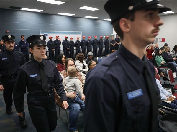 Photo Gallery: Toledo firefighter recruits take their oaths during family day event