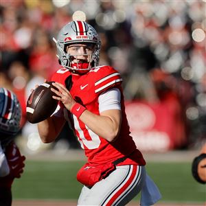 Ohio State quarterback Julian Sayin drops back to pass against Rutgers during the second half of an NCAA college football game on Nov. 22 in Columbus.