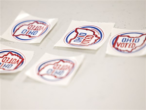 Voting rights groups threaten lawsuit over new Ohio elections law