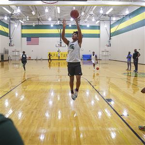 Kaden Mikolajczyk, of Start High School’s basketball team, shoots the ball during practice at Start High School in Toledo on Dec. 2.