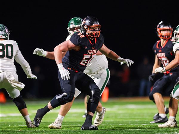 Liberty Center's Kellen Wymer breaks into the pocket as the Tigers host the Rockets of Oak Harbor in an OHSAA High school football game at Rex Lingruen Stadium on Nov. 7.