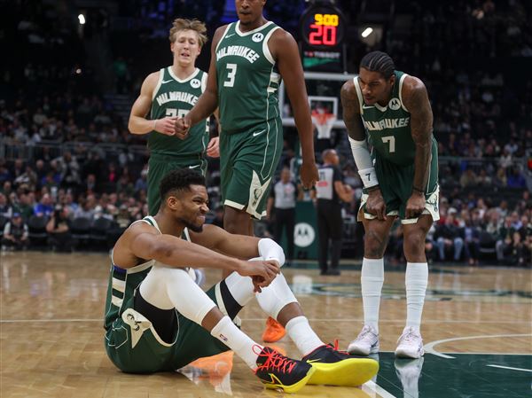 Bucks lose Antetokounmpo to injury early but rally past Pistons 113-109