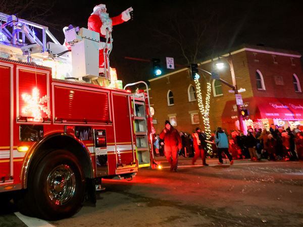 Firefighters, paramedics host breakfast with Santa