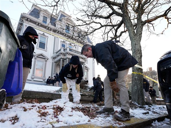 Search for the Brown University shooter resumes as questions swirl about campus security