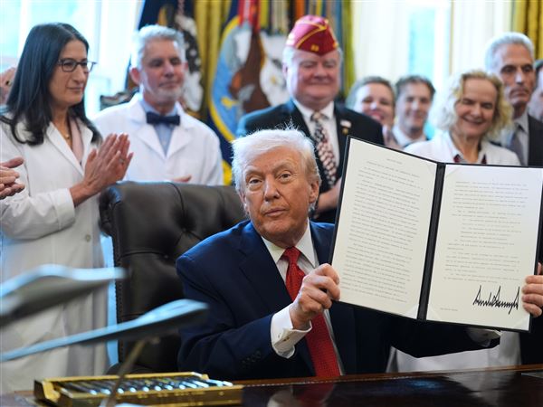 Trump signs executive order that could reclassify marijuana as a less dangerous drug