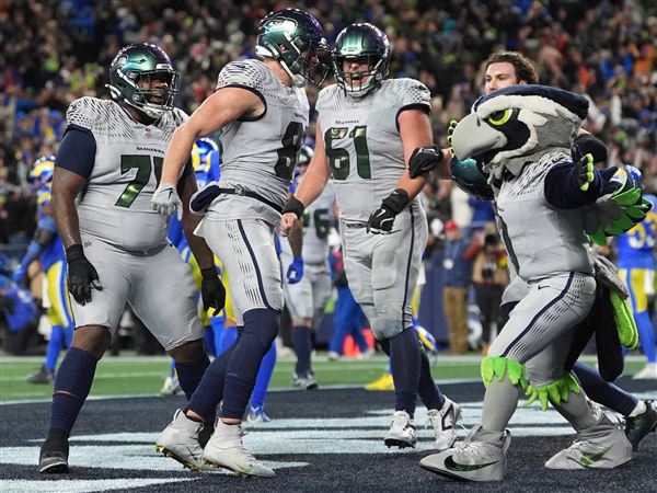Seahawks rally from 16-point deficit and stun Rams 38-37 in OT move atop NFC West