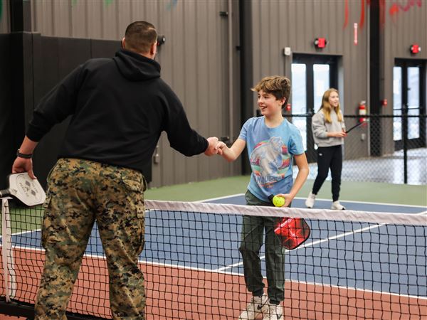 Photo Gallery: Paddle practice with Marines at Toledo Pickle's holiday event