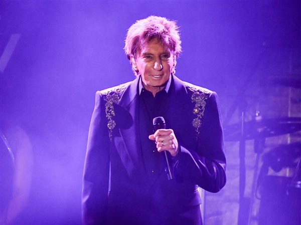 Barry Manilow to have surgery for early-stage lung cancer and postpones January concerts