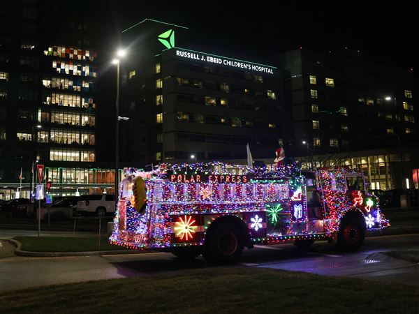 Photo Gallery: First responders light the way for Operation Santa’s Sleigh
