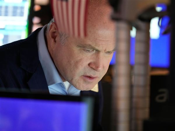 Stocks close slightly lower in quiet post-Christmas trading