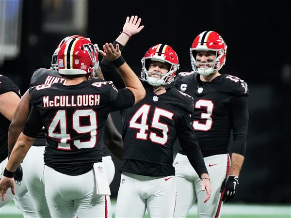 Robinson runs for 195 yards as Falcons recover to upset Rams 27-24 on 51-yard field goal by Gonzalez