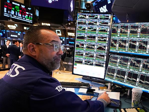 Stocks edge lower as 2025 winds down while gold and silver rise