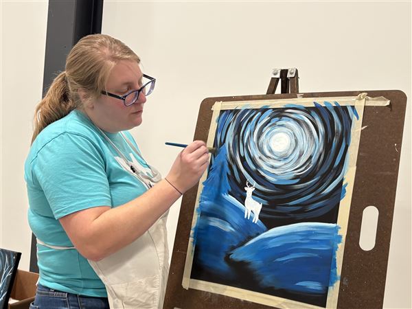 Painting class participants relax, reflect on new year