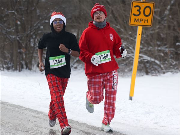 Photo Gallery: New Year's Day early risers take on 5K during Hangover Classic