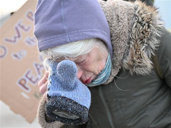 Minneapolis protesters vent their outrage after an ICE officer kills a woman