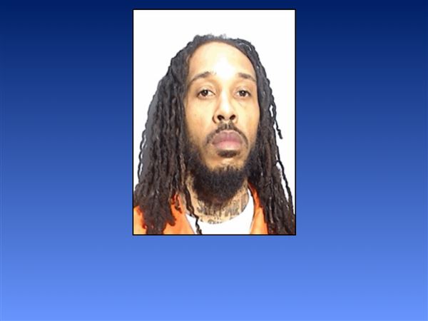 Wanted man arrested after exchanging gunfire with police