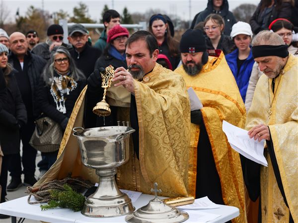 Photo gallery: Maumee River's waters blessed