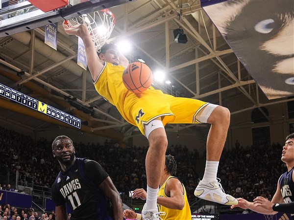 Michigan men&amp;#39;s basketball rebounds from 1st loss with 82-72 win at Washington