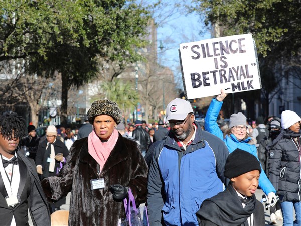 U.S. political climate spurs efforts to reclaim the MLK holiday