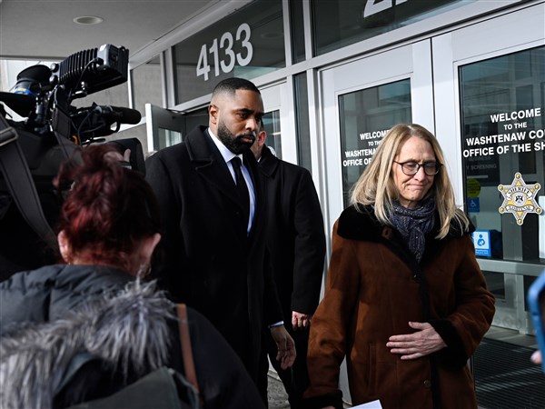 Lawyer for fired Michigan football coach Moore seeks to have charges dismissed