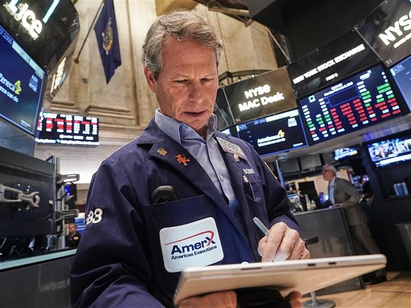 U.S. stocks climb as gold and silver prices keep falling