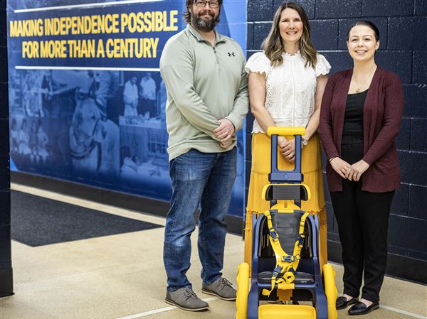 Church volunteers use 3-D printing to create adaptive toys for children