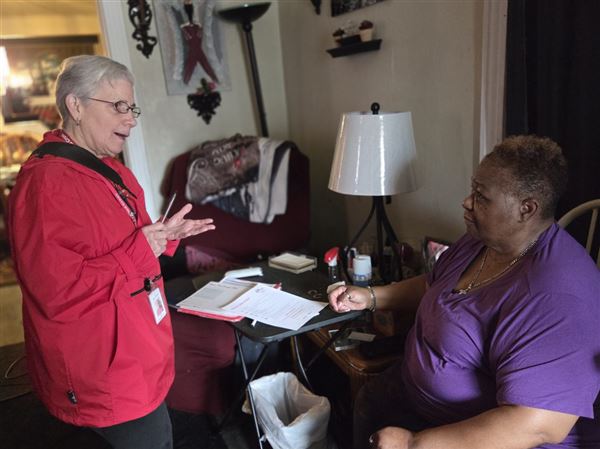 After deadly fire, crews go door-to-door with alarms