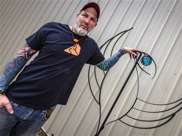 Sculptures grow in this Grand Rapids garden