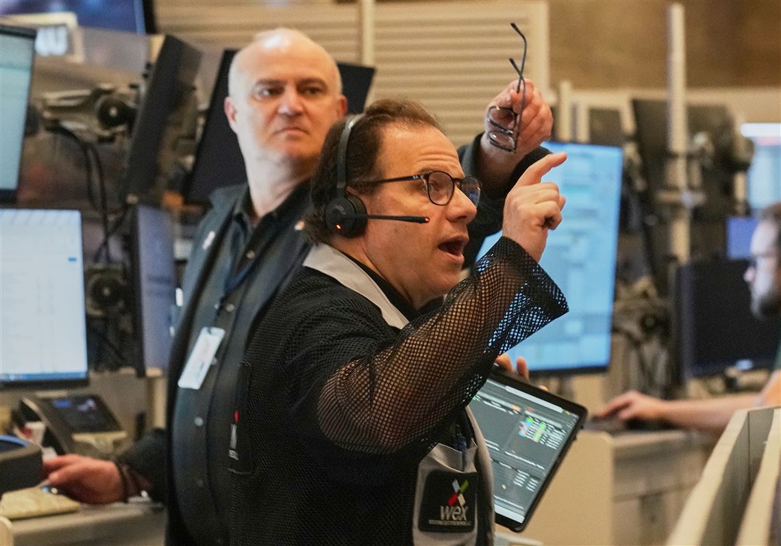 Wall Street drops from its records and oil prices jump after fighting flares in the Middle East