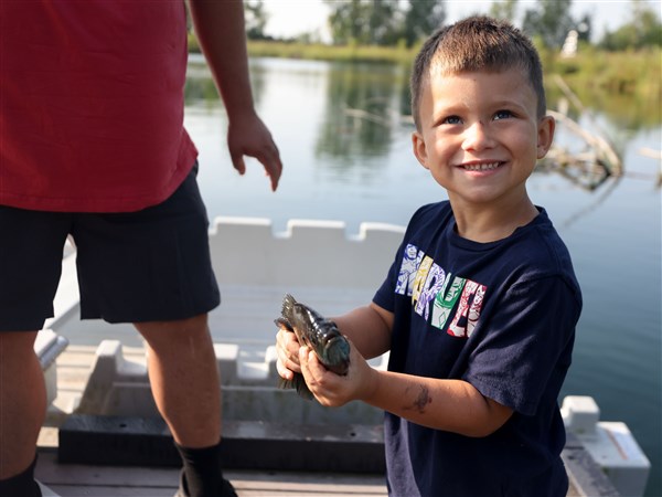 Youth anglers enjoy fishing at Cannonball Prairie Metropark