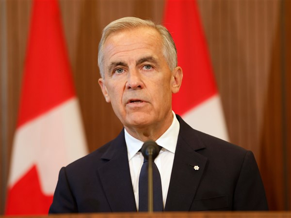 Canada will announce retaliatory tariffs against the United States on Tuesday, official tells AP